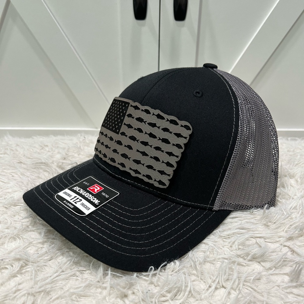 Laser engraved American flag fish. Richardson 112 trucker hat.
